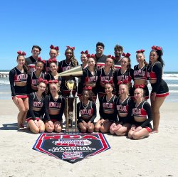 ǧý University Cheer Team members celebrate in Daytona Beach, Florida.